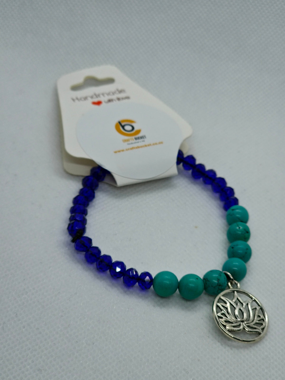 Lotus Charm: Turquoise & Navy Blue Stretch Bracelets
