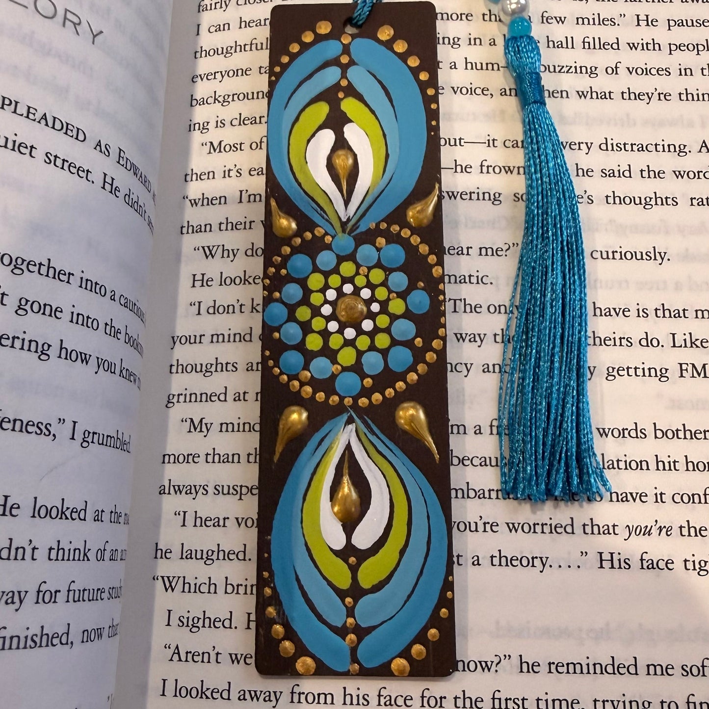 Decorative bookmark with tassel on an open book