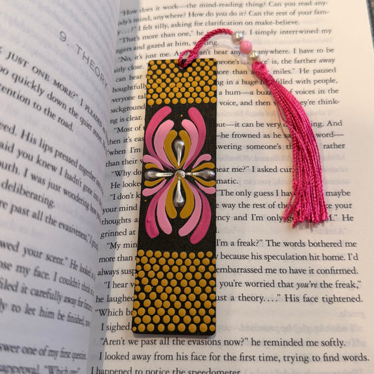 Elevate your reading ritual with this hand-painted wooden bookmark from Crafts Bucket.